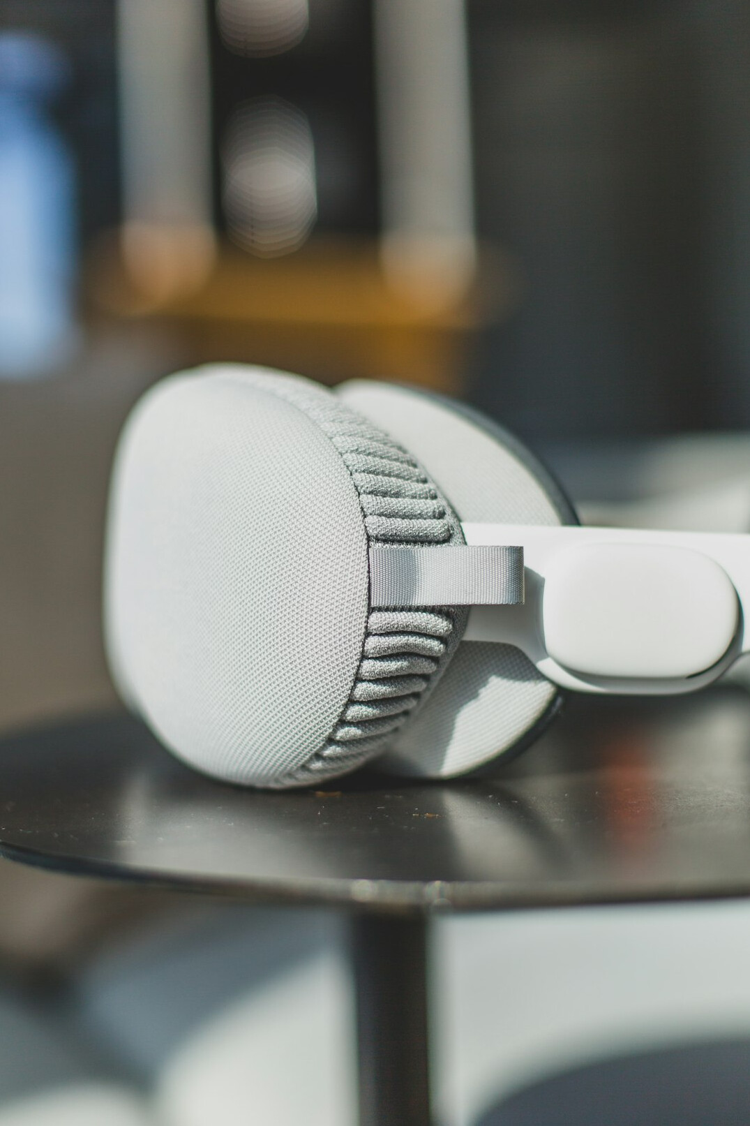Podcast microphone with headphones in a cozy recording studio