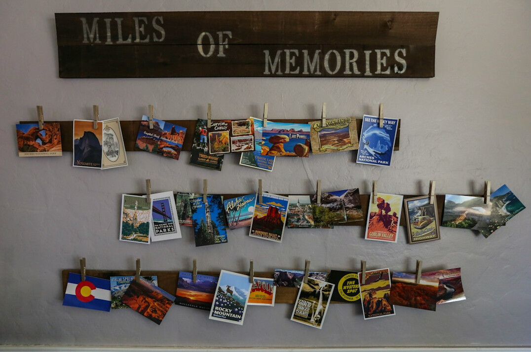 Timeline of notes and photographs pinned on a wall