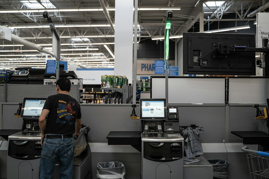 store security guard watching monitors