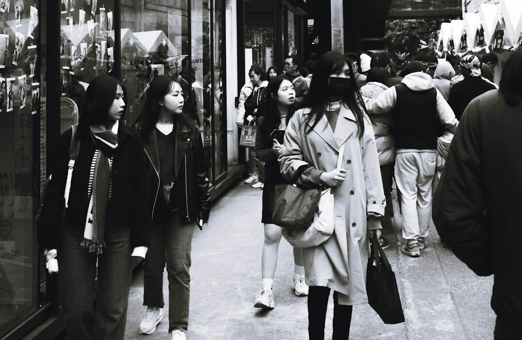 store detective watching shoppers