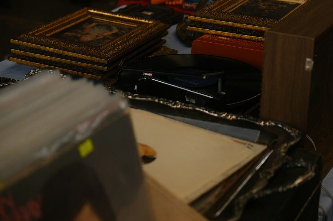 Archive folders and a magnifying glass over a printed record